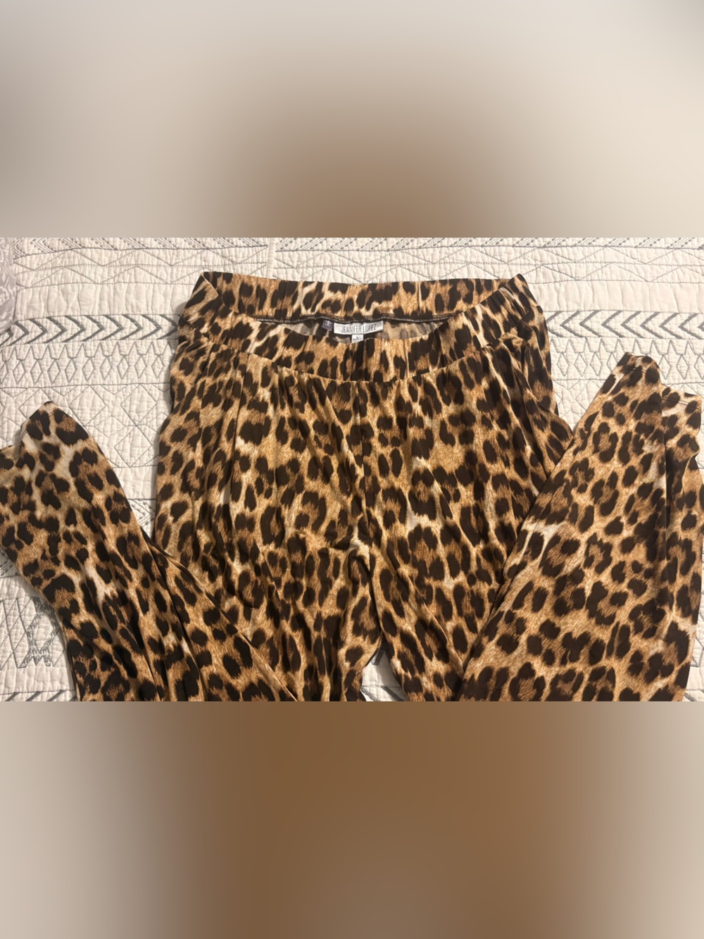 Jennifer Lopez Taupe and Black Leopard Wrap pants